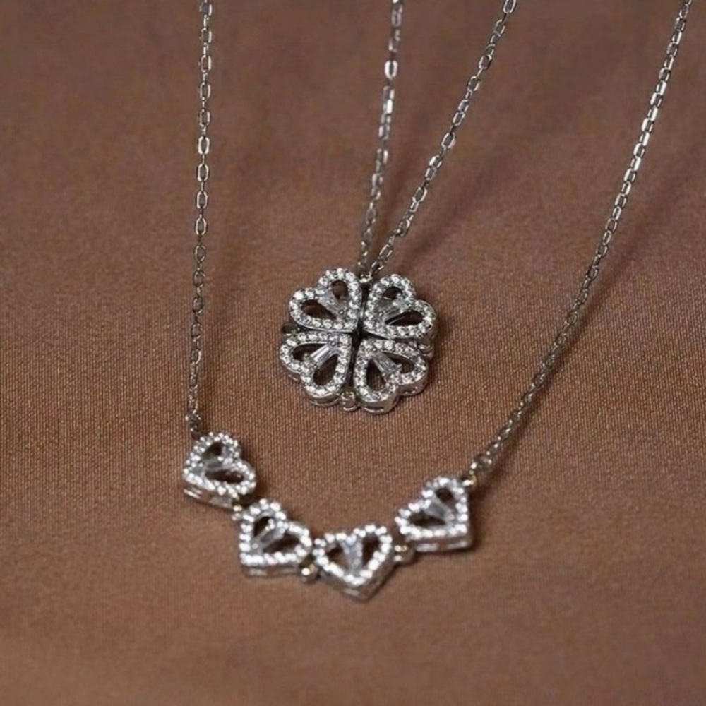 A beautiful Love four leaf clover stainless steel marked necklace comes in box